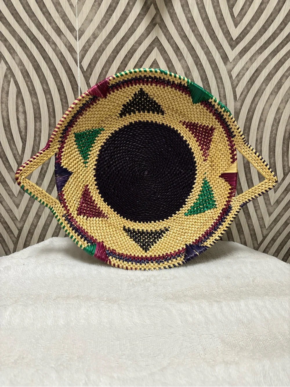 African hand woven colorful wall basket with handles